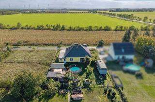 Haus kaufen in 14715 Milower Land, Milower Land - KENSINGTON - Exklusiv - Massiver Bungalow mit Pool in ruhiger, idyllischer Lage