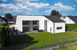 Haus kaufen in 33803 Steinhagen, Steinhagen - Moderne Architektur trifft Energieeffizienz und Wohnkomfort