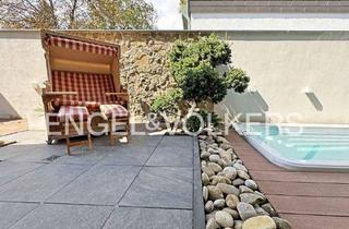 Wohnung kaufen in 61231 Bad Nauheim, Bad Nauheim - Kurparknähe trifft Luxus: Vermietete Wohnung mit Pool, Sauna, Garage
