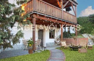 Wohnung kaufen in 61184 Karben, Karben - Vermietete Eigentumswohnung mit privatem Garten in zentraler Lage