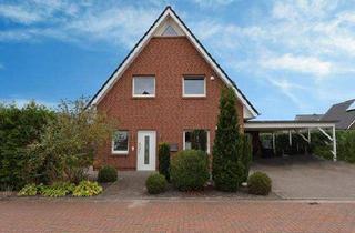 Haus kaufen in 26215 Wiefelstede, Wohnhaus mit zwei Wohneinheiten in Wiefelstede