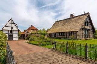 Haus kaufen in 26169 Friesoythe, Naturnahes Fachwerkhaus auf liebevollem Grundstück mit Spieker, Carport u. Pergola