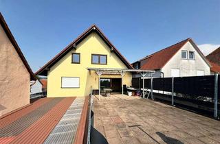 Haus kaufen in 63654 Büdingen, Nachhaltiges Familienidyll mit Einliegerwohnung und Weitblick