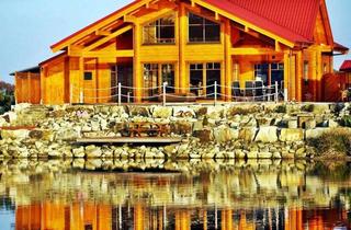 Haus kaufen in 48480 Lünne, Freistehendes Blockbohlenhaus direkt am See