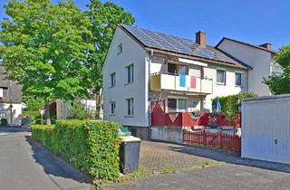 Anlageobjekt in 34225 Baunatal, Zweifamilienhaus mit frei werdender Wohnung in zentraler Lage von Altenbauna