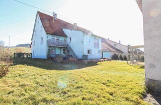 Anlageobjekt in 78594 Gunningen, Einfamilienhaus mit zwei Wohneinheiten und Scheune