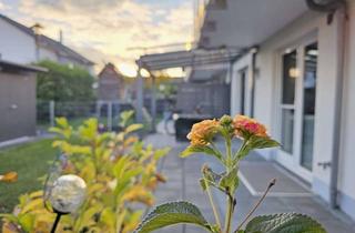 Wohnung kaufen in Grasweg 37, 85077 Manching, Stilvolle 3-Zimmerwohnung mit großem Garten, Überdachung & zwei Stellplätzen in ruhiger Sackgasse