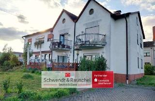 Haus kaufen in 61200 Wölfersheim, 3 Familienhaus mit Frisörsalon in Wölfersheim-Melbach