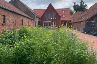 Wohnung kaufen in 26524 Hage, Hage - 80 m² Oberwohnung mit Galerie und Balkon zum Selbstausbau