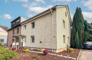Haus kaufen in 44357 Dortmund, Dortmund - Zweifamilienhaus mit Top-Ausstattung und Gartenoase in Waldrandlage zur flexiblen Nutzung
