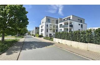 Wohnung kaufen in 61184 Karben, Karben - Stilvolle Ruheoase mit Garten - Ihre Erdgeschossperle im Grünen