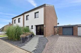 Doppelhaushälfte kaufen in 41372 Niederkrüchten, Niederkrüchten - Wohlfühlhaus mit Wintergarten und sonniger Südterrasse.