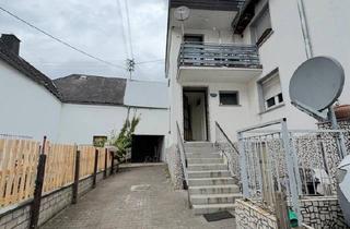 Haus kaufen in 65599 Dornburg, Dornburg - Attraktives Zweifamilienhaus als Kapitalanlage in Frickhofen