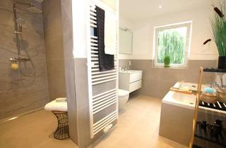 Wohnung kaufen in 61231 Bad Nauheim, Neurenovierte 4-Zimmer-Wohnung mit hochwertigem Tageslichtbad