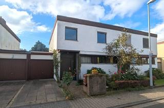 Doppelhaushälfte kaufen in 65760 Eschborn, Gut gelegene Doppelhaushälfte mit schönem Garten & Garage – ideal für Familien