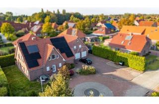 Einfamilienhaus kaufen in 26529 Upgant-Schott, Attraktives Einfamilienhaus mit ELW und Doppelgarage in Sackgassenendlage