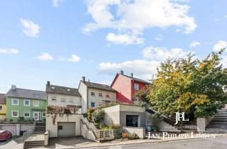 Reihenhaus kaufen in 96132 Schlüsselfeld, Familienfreundliches Reihenhaus mit Garage, Stellplatz & Garten