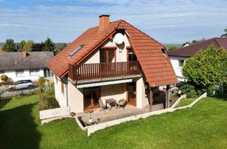 Haus kaufen in 55286 Wörrstadt, Raumwunder mit Gartenidylle – Familienhaus mit hellem, beheiztem Hobbyraum