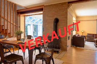 Haus kaufen in 49356 Diepholz, Licht & Wärme: Wintergarten mit Kachelofen – Bungalowtraum in ruhiger Lage