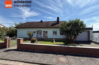 Einfamilienhaus kaufen in 65558 Holzheim, Freistehendes Einfamilienhaus mit zwei Garagen und großen Grundstück in Holzheim!