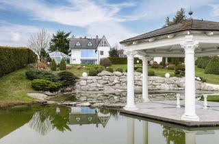 Villa kaufen in 35789 Weilmünster, Unternehmervilla mit parkähnlichem Grundstück, Schwimmteich, mit Pool und luxuriöser Ausstattung.