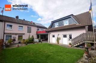 Haus kaufen in 36119 Neuhof, Zweifamilienhaus mit vielseitigem Wohnkonzept, Einliegerwohnung & gepflegtem Garten in Neuhof