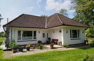 Haus kaufen in 25779 Wiemerstedt, Gepflegter Winkelbungalow mit Wintergarten und Hauskoppel in Wiemerstedt
