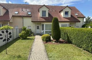 Haus kaufen in 06792 Sandersdorf, Exklusive Anlagechance: Vermietetes Reihenmittelhaus mit idyllischem Ausblick in bester Lage!