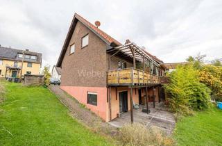 Anlageobjekt in 51570 Windeck, Voll vermietetes MFH mit zwei Balkonen, Terrasse und großem Garten