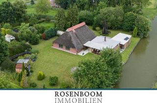 Haus kaufen in 26939 Ovelgönne, Historisches Reetdachhaus mit parkähnlichem Garten und direkter Wasserlage