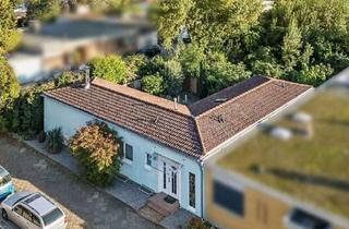 Haus kaufen in 67063 Friesenheim/Nord, Attraktiver Winkelbungalow in ruhiger Lage von Ludwigshafen-Friesenheim