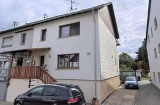 Einfamilienhaus kaufen in 66793 Saarwellingen, Gepflegtes Einfamilienhaus mit schönem Garten und Garage in zentraler Lage von Schwarzenholz