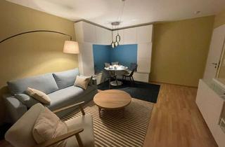 Immobilie mieten in Am Heiligenstock, 65719 Hofheim am Taunus, Stilvoll möblierte 2-Zimmer-Wohnung mit Balkon und Skylineblick in Hofheim-Marxheim