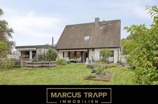 Einfamilienhaus kaufen in 41372 Niederkrüchten, Charmantes Wohnhaus mit Anbau und großem Garten – Der perfekte Ort für Familienglück