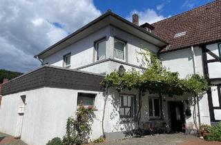 Haus kaufen in 49324 Melle, Melle - Wohn- und Geschäftshaus mit Balkon, Gartenblick