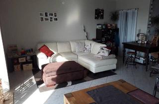 Wohnung kaufen in 61194 Niddatal, Niddatal - Lichtdurchflutete 3-Zimmer Wohnung mit Skylineblick