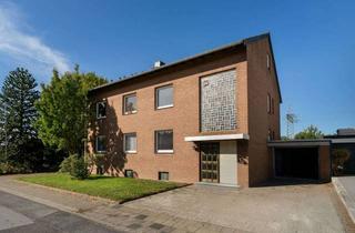 Mehrfamilienhaus kaufen in 41569 Rommerskirchen, Mehrfamilienhaus mit großem Garten, Garage und Gewerbeeinheit