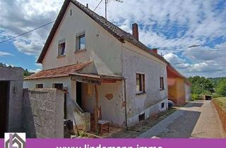 Einfamilienhaus kaufen in 66822 Lebach, Aschbach: Vermietetes Einfamilienhaus mit umfassendem Sanierungsbedarf
