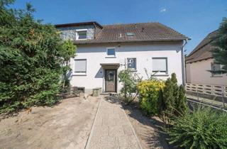 Doppelhaushälfte kaufen in 63263 Neu-Isenburg, Große Doppelhaushälfte mit 2 separaten Wohnungen im Buchenbusch