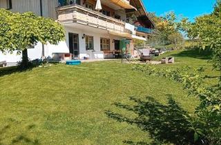 Wohnung kaufen in 83083 Riedering, Riedering - 4 Zimmer EG Whg in EFH Größe mit Doppelg., Garten und Kachelofen