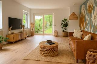 Wohnung kaufen in 34537 Bad Wildungen, Bad Wildungen - Helle, kernsanierte Souterrainwohnung mit Terrasse