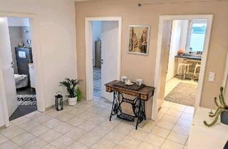 Wohnung kaufen in 33803 Steinhagen, Steinhagen - 3-Zimmer-Eigentumswohnung mit Balkon, EBK und Kamin