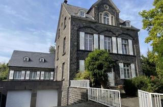 Einfamilienhaus kaufen in 56743 Mendig, Großes Anwesen mit Einfamilienhaus & Doppelgarage mitten in Mendig.