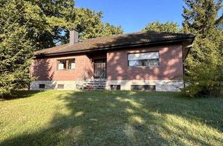 Haus kaufen in 96465 Neustadt, Bungalow in Ortsrandlage mit Blick auf Bäume und Natur