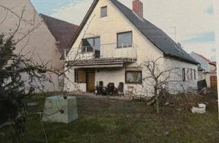 Haus kaufen in 97355 Kleinlangheim, Kleinlangheim - Zwei Häuser zu Verkaufen mit sehr großem Grundstück.