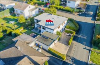 Haus kaufen in 35649 Bischoffen, ++ KRAG Immobilien ++ Zwei Generationen: Hauptwohnung mit Weitblick, unten Terrasse ++
