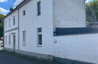 Einfamilienhaus kaufen in 41189 Mönchengladbach, Einfamilienhaus mit zusätzlichem Gewerbebereich zu verkaufen