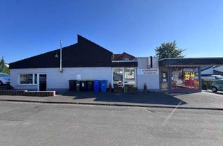 Haus kaufen in 35435 Wettenberg, Attraktives Wohn- und Geschäftshaus in Wettenberg - modernisiert und renditestark