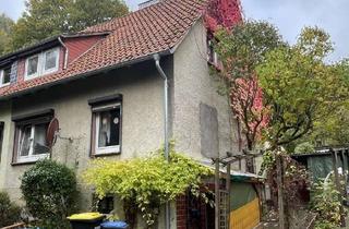 Haus kaufen in 31084 Freden, Renovierungsbedürftige DHH in Freden