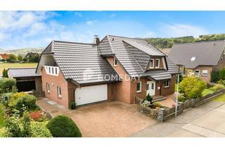 Einfamilienhaus kaufen in 32479 Hille, Großzügiges Einfamilienhaus mit Gartenidylle und moderner Ausstattung